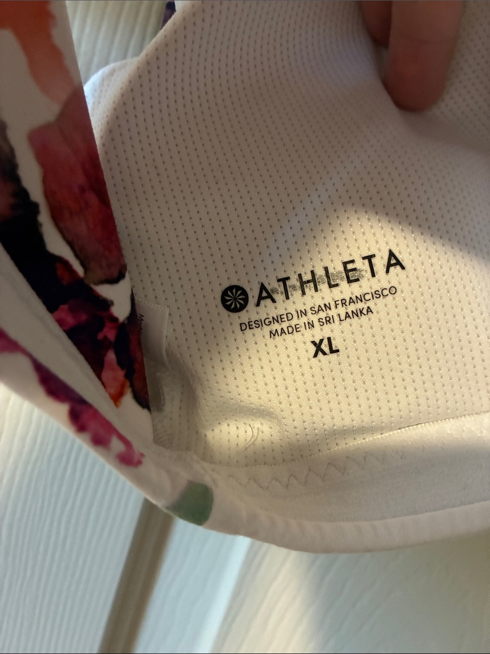 Athleta Floral Watercolor Strappy Sports Bra in White, Purple, Pink, Navy - Picture 2 of 5